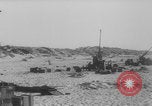 Image of Allied Military equipment and dead soldiers scattered Dunkirk France, 1940, second 35 stock footage video 65675078989
