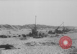 Image of Allied Military equipment and dead soldiers scattered Dunkirk France, 1940, second 36 stock footage video 65675078989