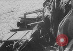 Image of Allied Military equipment and dead soldiers scattered Dunkirk France, 1940, second 52 stock footage video 65675078989