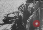 Image of Allied Military equipment and dead soldiers scattered Dunkirk France, 1940, second 53 stock footage video 65675078989