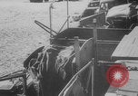 Image of Allied Military equipment and dead soldiers scattered Dunkirk France, 1940, second 55 stock footage video 65675078989