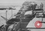 Image of Allied Military equipment and dead soldiers scattered Dunkirk France, 1940, second 57 stock footage video 65675078989