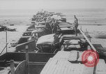 Image of Allied Military equipment and dead soldiers scattered Dunkirk France, 1940, second 59 stock footage video 65675078989
