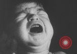 Image of children fighting playroom United States USA, 1971, second 8 stock footage video 65675079018