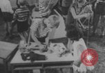 Image of children fighting playroom United States USA, 1971, second 30 stock footage video 65675079018