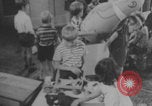 Image of children fighting playroom United States USA, 1971, second 31 stock footage video 65675079018