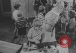 Image of children fighting playroom United States USA, 1971, second 32 stock footage video 65675079018