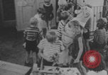 Image of children fighting playroom United States USA, 1971, second 34 stock footage video 65675079018