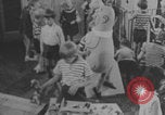 Image of children fighting playroom United States USA, 1971, second 39 stock footage video 65675079018