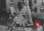 Image of children fighting playroom United States USA, 1971, second 40 stock footage video 65675079018