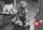Image of children fighting playroom United States USA, 1971, second 42 stock footage video 65675079018