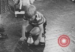 Image of children fighting playroom United States USA, 1971, second 44 stock footage video 65675079018