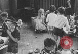 Image of children fighting playroom United States USA, 1971, second 48 stock footage video 65675079018