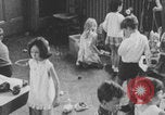 Image of children fighting playroom United States USA, 1971, second 50 stock footage video 65675079018