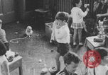 Image of children fighting playroom United States USA, 1971, second 51 stock footage video 65675079018