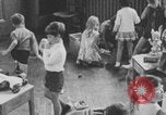 Image of children fighting playroom United States USA, 1971, second 52 stock footage video 65675079018