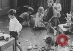 Image of children fighting playroom United States USA, 1971, second 53 stock footage video 65675079018