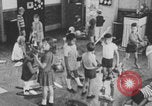 Image of children fighting playroom United States USA, 1971, second 57 stock footage video 65675079018