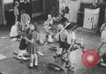 Image of children fighting playroom United States USA, 1971, second 59 stock footage video 65675079018