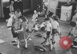 Image of children fighting playroom United States USA, 1971, second 60 stock footage video 65675079018