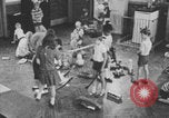 Image of children fighting playroom United States USA, 1971, second 62 stock footage video 65675079018