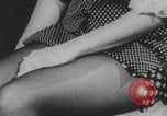 Image of Woman in go go boots and mini skirt London England United Kingdom, 1969, second 10 stock footage video 65675079020