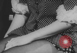 Image of Woman in go go boots and mini skirt London England United Kingdom, 1969, second 11 stock footage video 65675079020