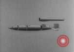 Image of V-1 rocket parts labeled Germany, 1944, second 45 stock footage video 65675079126