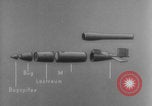 Image of V-1 rocket parts labeled Germany, 1944, second 49 stock footage video 65675079126