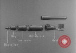 Image of V-1 rocket parts labeled Germany, 1944, second 50 stock footage video 65675079126