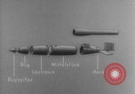 Image of V-1 rocket parts labeled Germany, 1944, second 51 stock footage video 65675079126