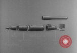 Image of V-1 rocket parts labeled Germany, 1944, second 57 stock footage video 65675079126