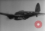 Image of Heinkel He 111 with V-1 mounted Germany, 1943, second 57 stock footage video 65675079138