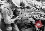 Image of British soldiers assisting German wounded Europe, 1916, second 13 stock footage video 65675079182