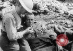 Image of British soldiers assisting German wounded Europe, 1916, second 14 stock footage video 65675079182