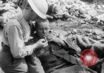 Image of British soldiers assisting German wounded Europe, 1916, second 15 stock footage video 65675079182