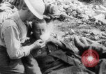 Image of British soldiers assisting German wounded Europe, 1916, second 16 stock footage video 65675079182