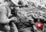 Image of British soldiers assisting German wounded Europe, 1916, second 17 stock footage video 65675079182