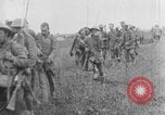 Image of British soldiers assisting German wounded Europe, 1916, second 25 stock footage video 65675079182
