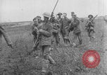 Image of British soldiers assisting German wounded Europe, 1916, second 27 stock footage video 65675079182