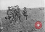 Image of British soldiers assisting German wounded Europe, 1916, second 29 stock footage video 65675079182