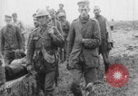 Image of British soldiers assisting German wounded Europe, 1916, second 30 stock footage video 65675079182