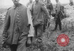 Image of British soldiers assisting German wounded Europe, 1916, second 34 stock footage video 65675079182
