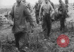 Image of British soldiers assisting German wounded Europe, 1916, second 35 stock footage video 65675079182