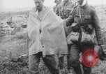 Image of British soldiers assisting German wounded Europe, 1916, second 39 stock footage video 65675079182