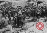 Image of British soldiers assisting German wounded Europe, 1916, second 52 stock footage video 65675079182