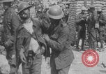 Image of British soldiers assisting German wounded Europe, 1916, second 54 stock footage video 65675079182