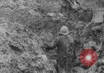 Image of muddy battlefield WWI Verdun France, 1916, second 5 stock footage video 65675079217