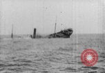 Image of torpedo sinking ship WWI Europe, 1916, second 10 stock footage video 65675079256