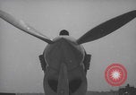 Image of Henry Ford with WWII planes Dearborn Michigan USA, 1940, second 28 stock footage video 65675079263